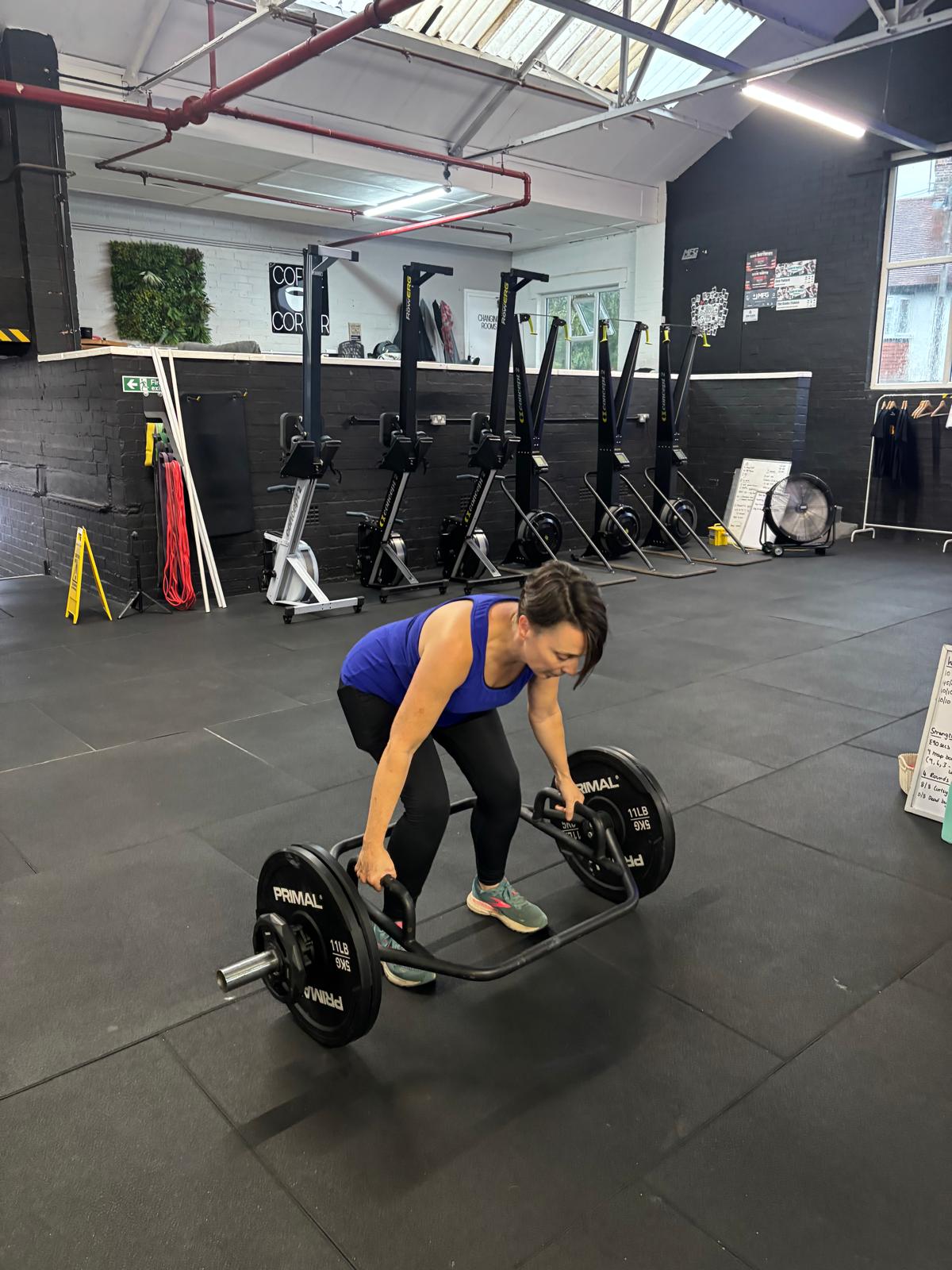 Woman training with weights